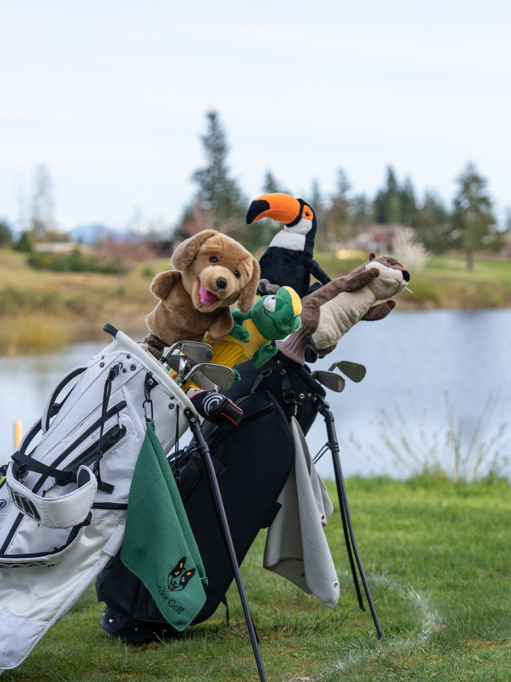Golf bags featuring animal golf driver headcovers, including a dog, toucan and other birdies, and wildlife designs; perfect custom golf gear for players who love animals, dogs, and nature-inspired golf accessories.